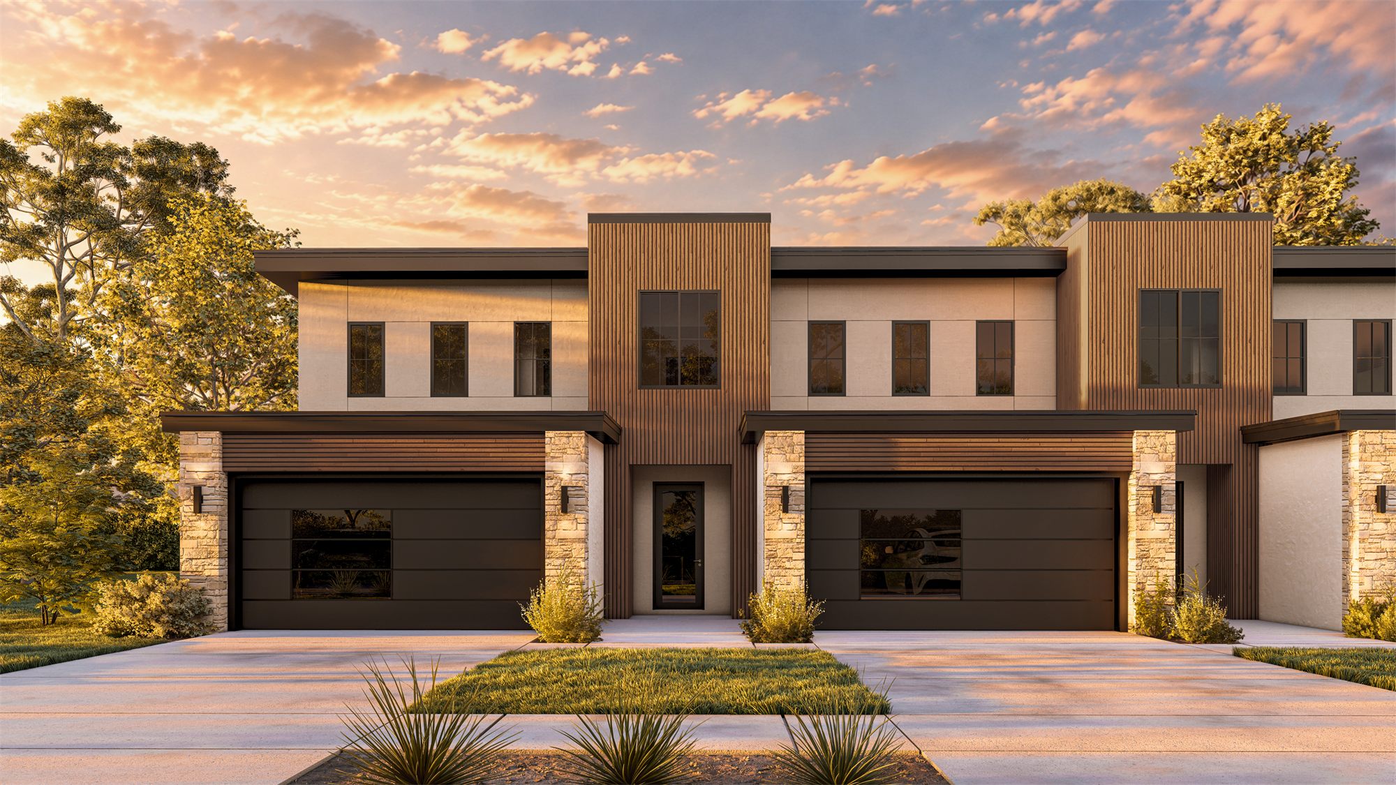 Front of two Davenport townhouse units with garages and wood-clad entries