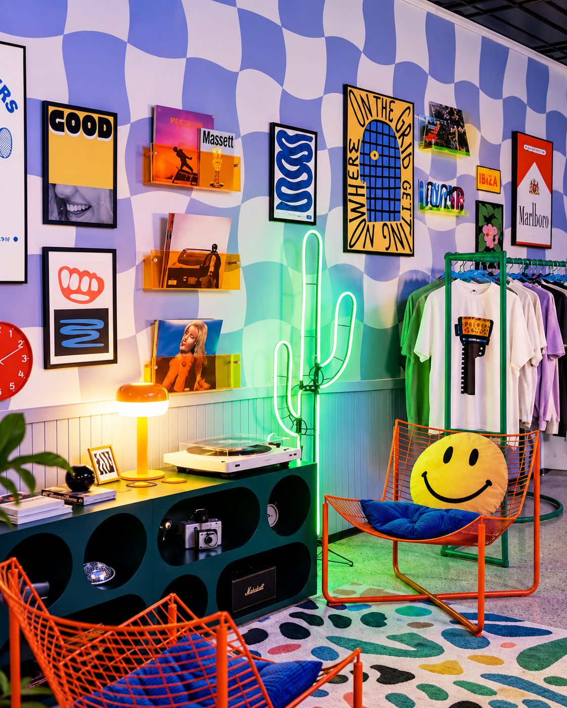 Retail corner with a turntable, posters, and seating